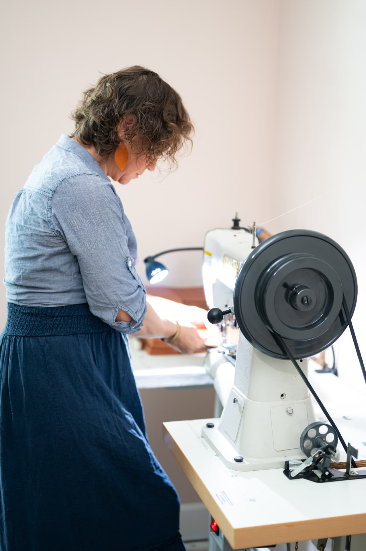 Sarah at her industrial sewing machine
